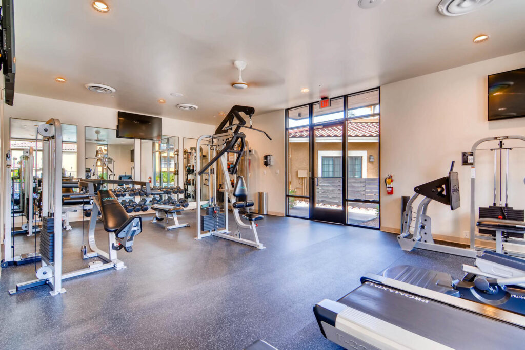 fitness center with cardio and strength equipment