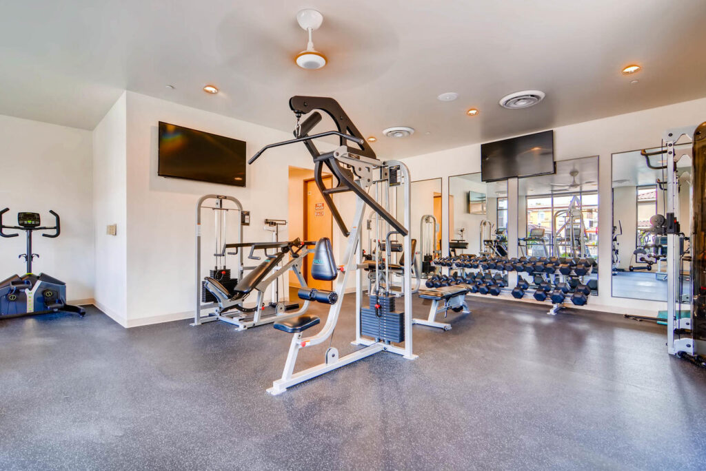 fitness center with free weights and machines