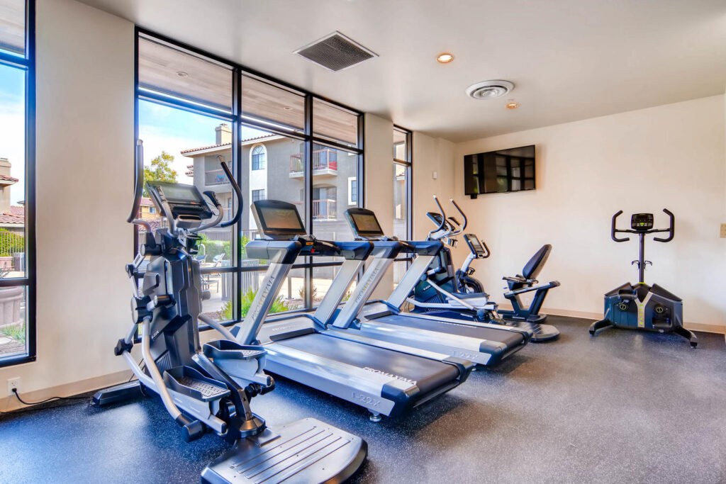 Fitness center with machines at Chazal Scottsdale apartments for rent.